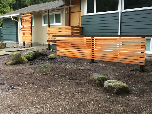 A fencing installation done by West Coast Fencing, displayed as a work sample.