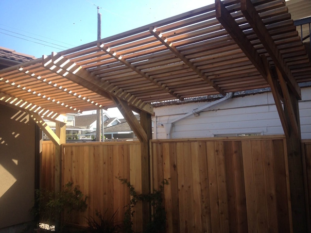 A fencing installation done by West Coast Fencing, displayed as a work sample.