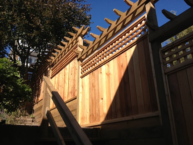 A fencing installation done by West Coast Fencing, displayed as a work sample.