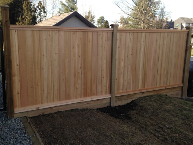 A fencing installation done by West Coast Fencing, displayed as a work sample.