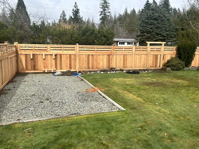 A fencing installation done by West Coast Fencing, displayed as a work sample.