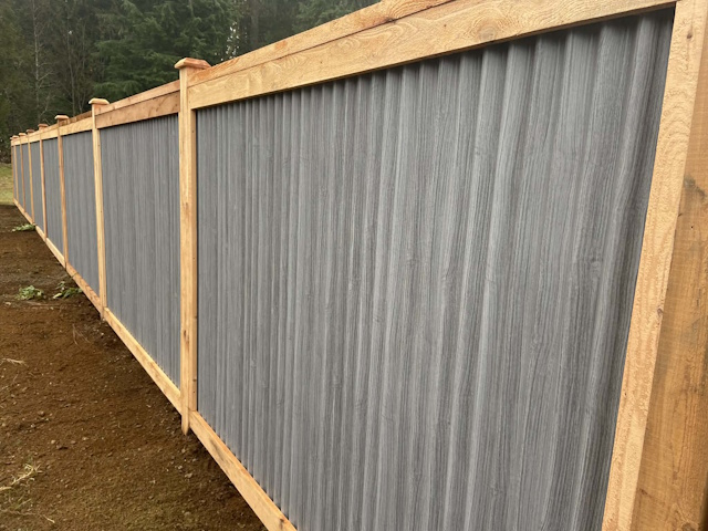 A fencing installation done by West Coast Fencing, displayed as a work sample.