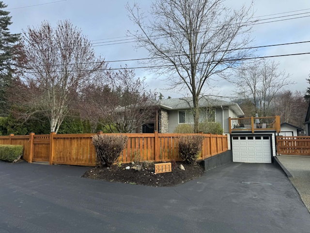 A fencing installation done by West Coast Fencing, displayed as a work sample.
